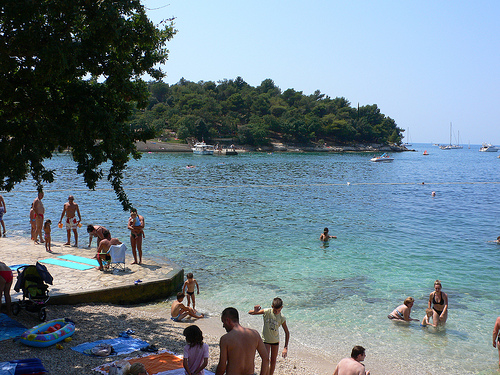 Family swimming in Istria, Croatia