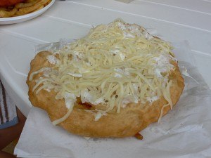 Lángos with sour cream and cheese in Hungary