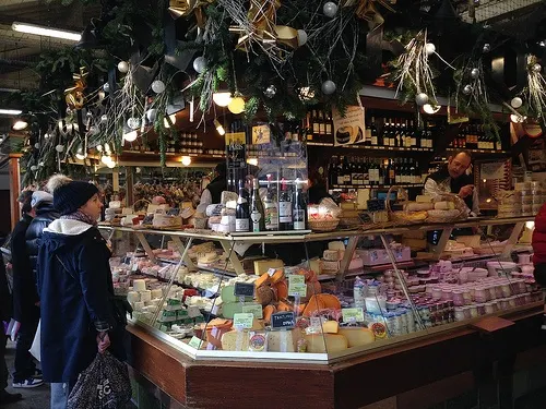 Cheese stall in the covered market at Marche d'Aligre in Paris Photo: Heatheronhertravels.com