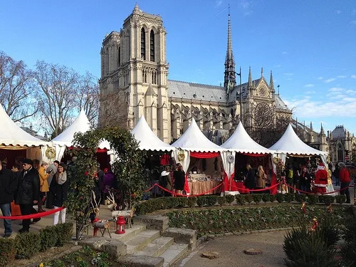 Christmas market in front of Notre Dame in Paris Photo: Heatheronhertravels.com