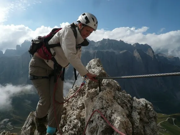 Concentrating at a tricky bit on the Via Ferrata Photo: Heatheronhertravels.com