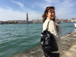 Heather wearing the Sparano leather backpack from Maxwell Scott Bags in Venice - San Georgio