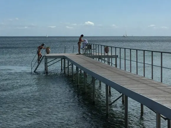 Bathers at the jetty at Kurhotel Skodsborg Photo: Heatheronhertravels.com