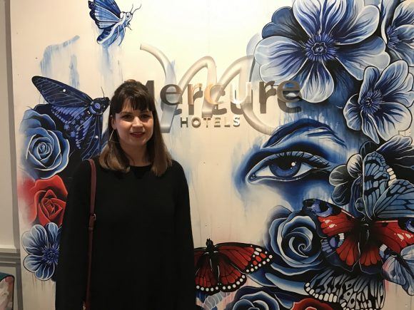 Gemma Compton with her artwork at Mercure Grand Hotel photo: Heatheronhertravels.com