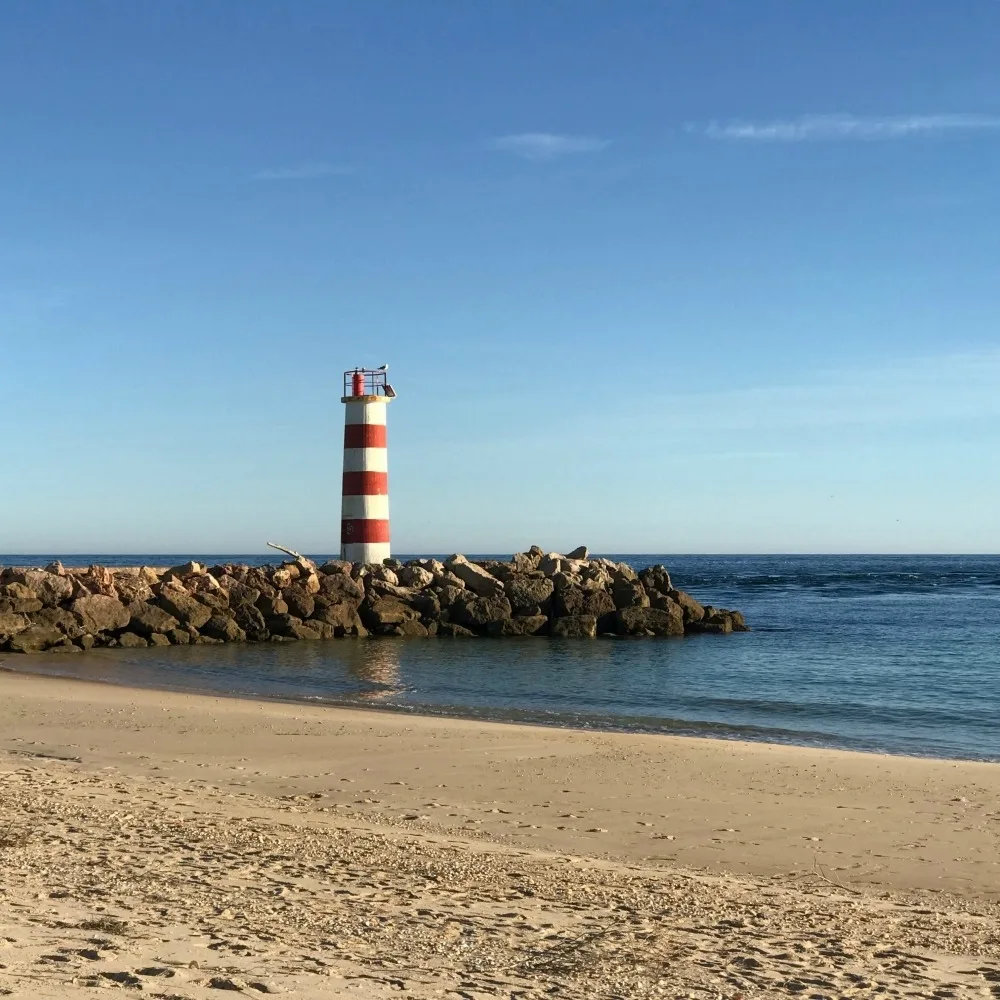 Lighthouse on Ilha Deserta on Ria Formosa Boat trip from Faro Photo Heatheronhertravels