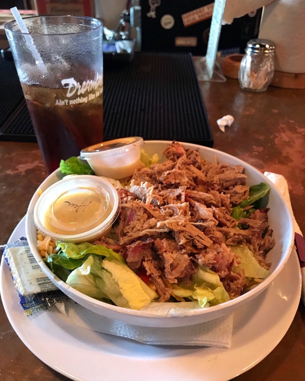 Smokehouse cobb salad with Pulled Pork at Dreamland in Montgomery Alabama Photo Heatheronhertravels