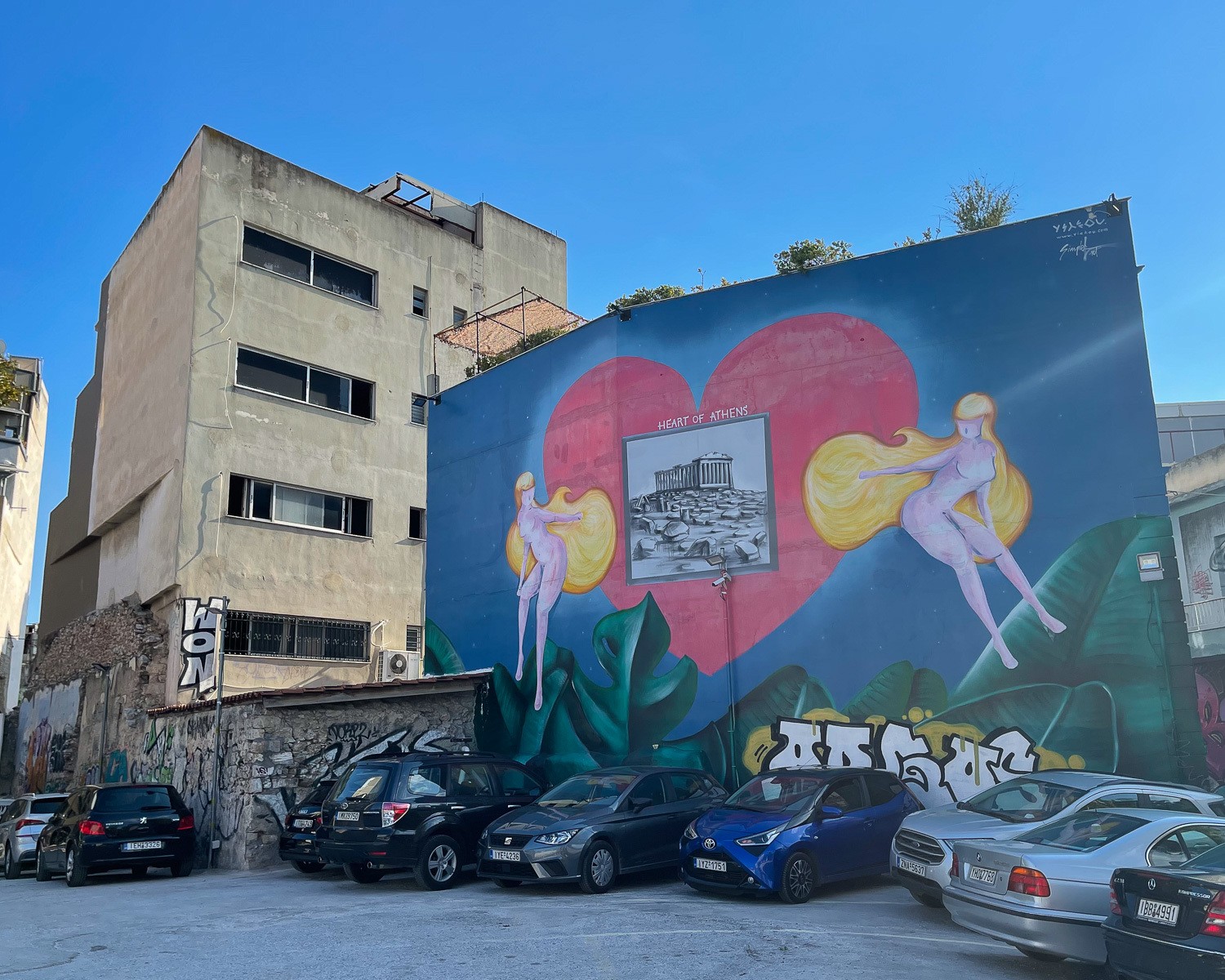 Mural in Psiri Athens - Heart of Athens by Yiakou and Simple G Photo Heatheronhertravels.com