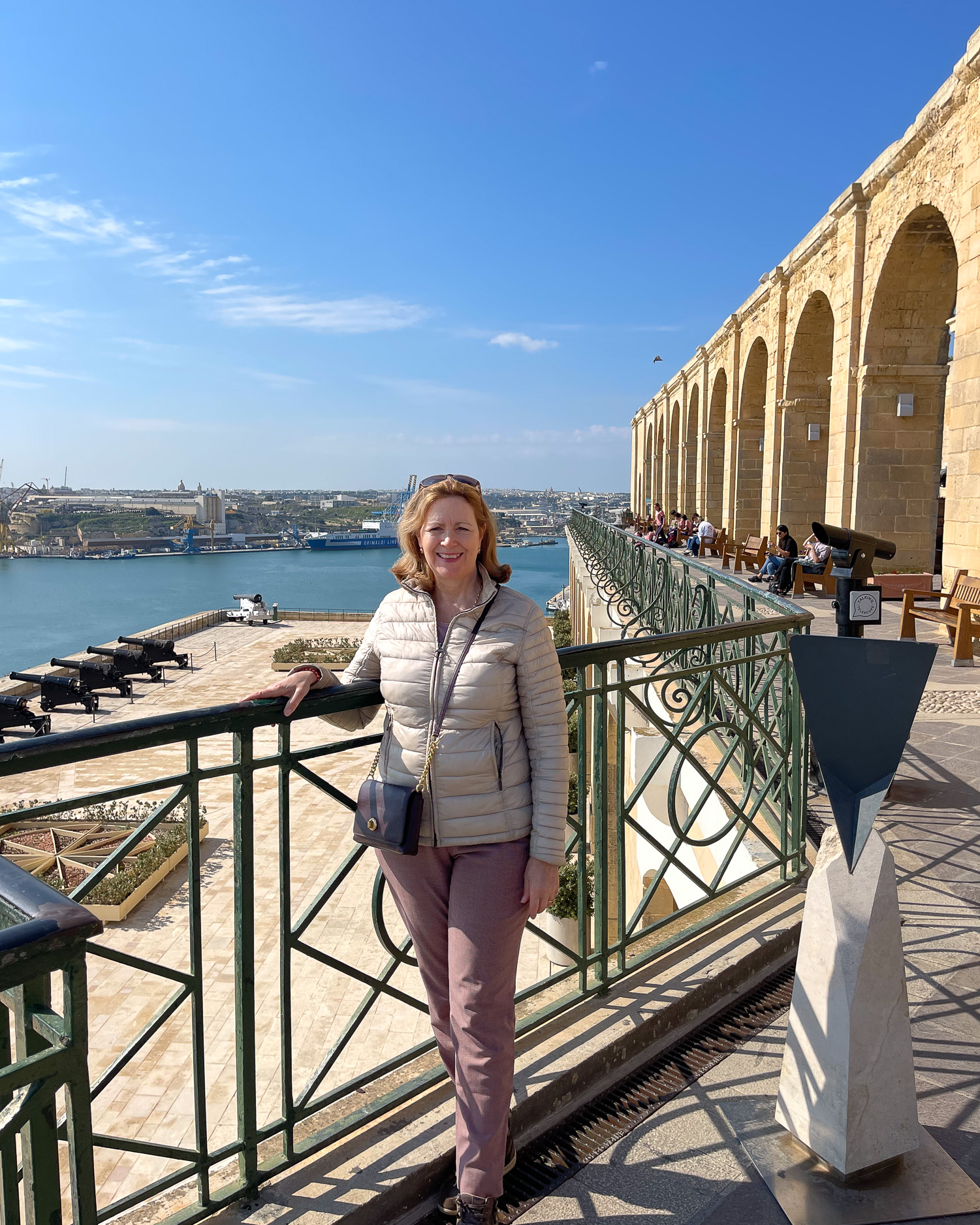 Heather at the colonades of the Upper Barrakka Gardens Valletta Malta Photo Heatheronhertravels.com