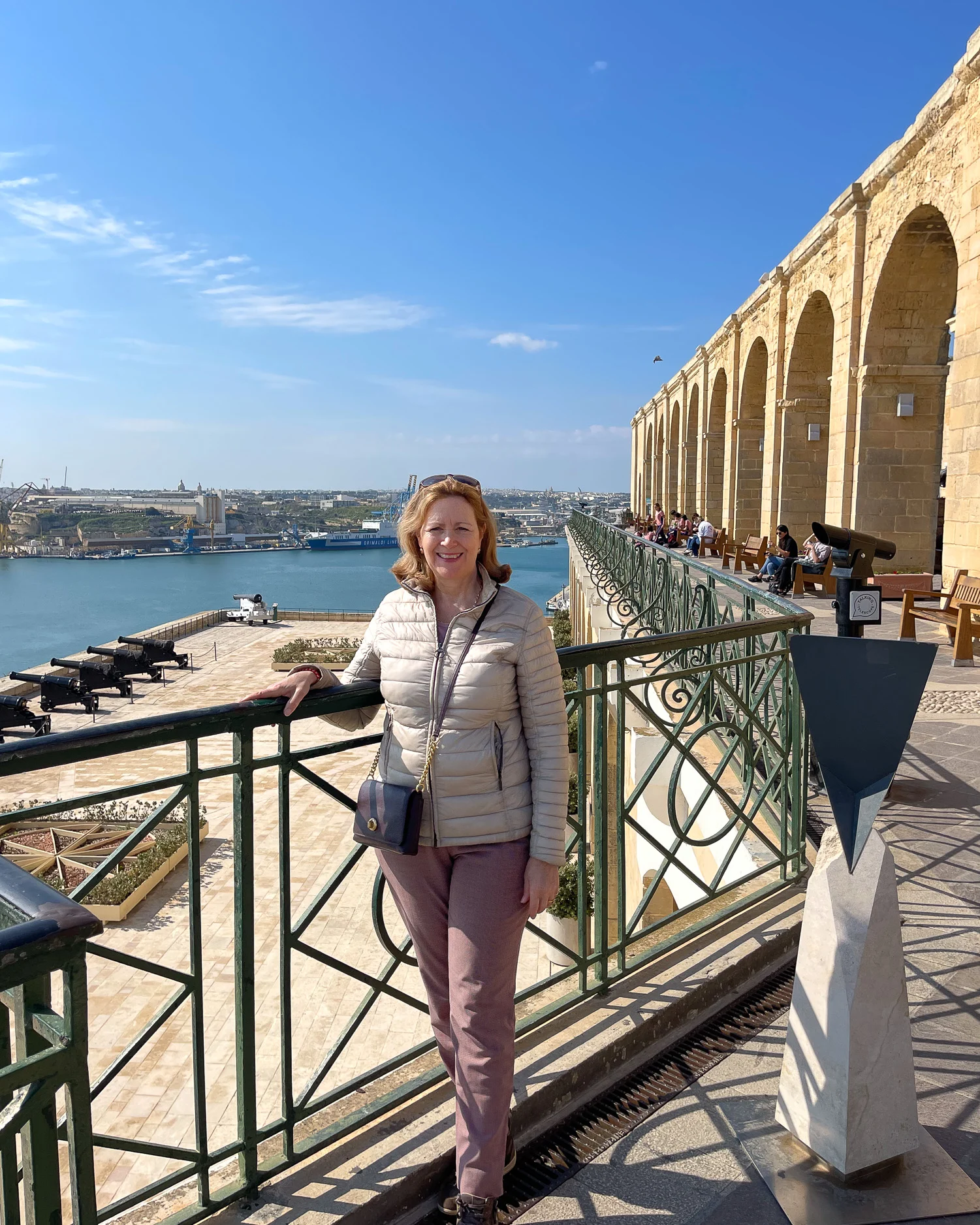 Heather at the colonades of the Upper Barrakka Gardens Valletta Malta Photo Heatheronhertravels.com